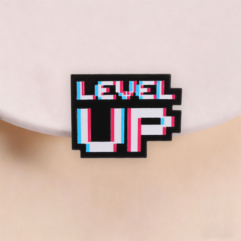 Distintivo Level Up Glitch Pix - Retro Gaming Gifts recensione e prezzo